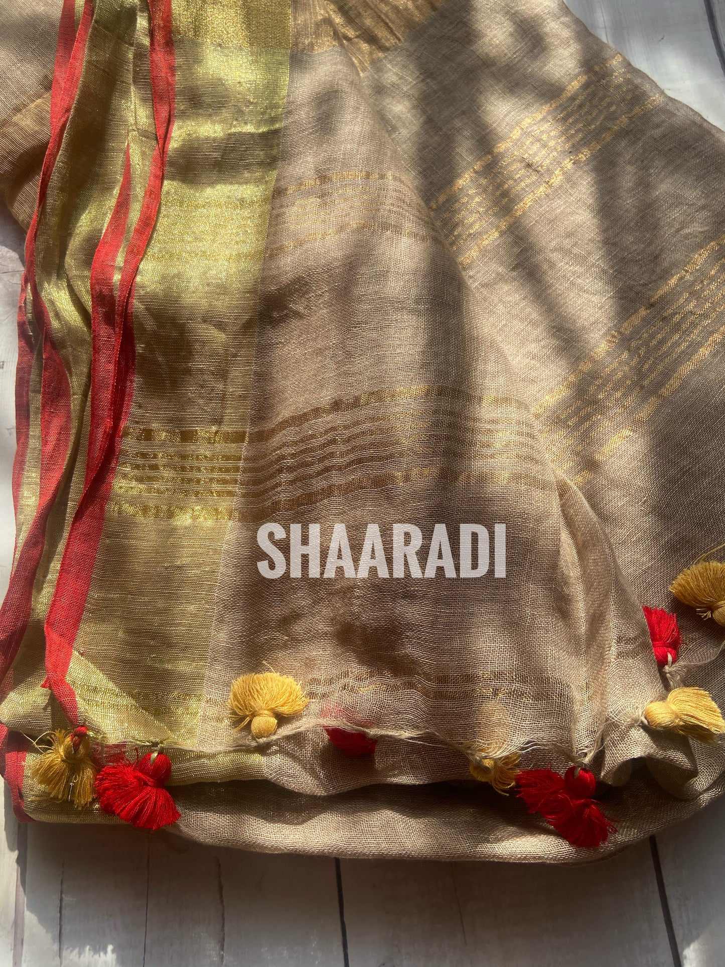 Goldy Beige Linen Saree