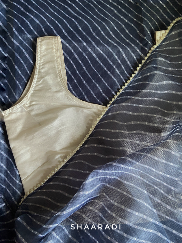 Pearls in Grey Leheriya Saree