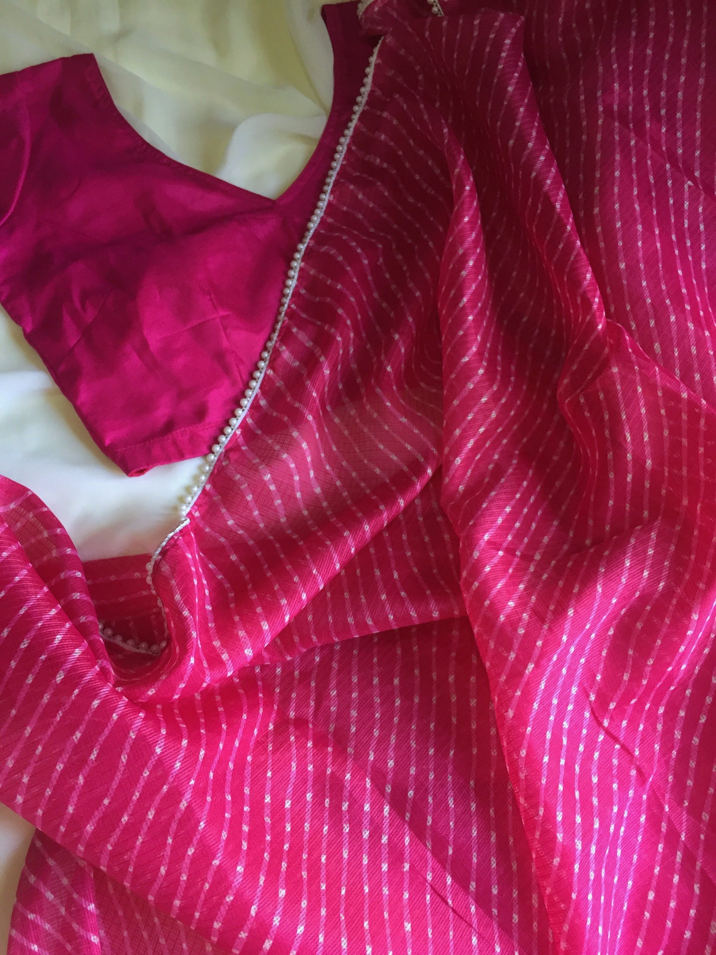 Pearls in Pink Leheriya Saree