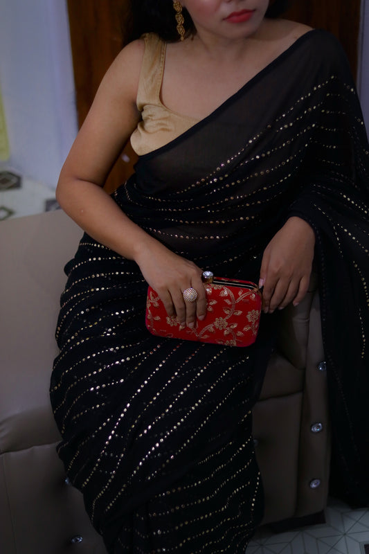 Golden Dreams on Black Saree