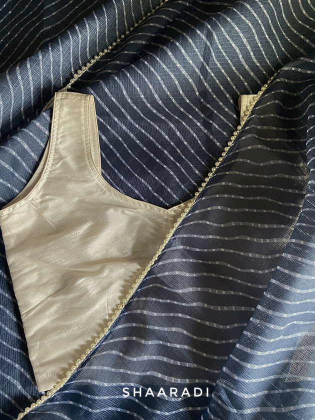 Pearls in Grey Leheriya Saree