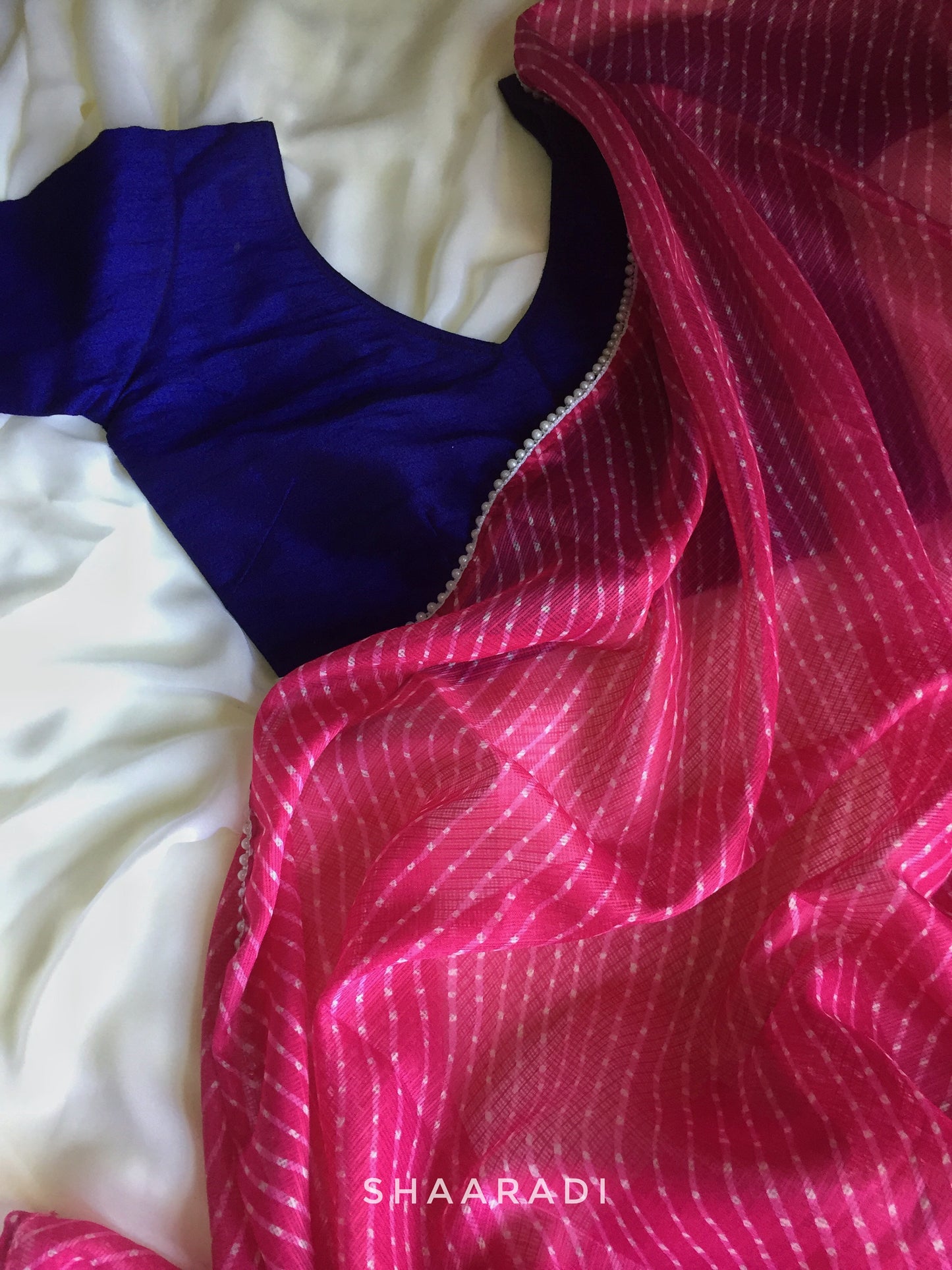 Pearls in Pink Leheriya Saree