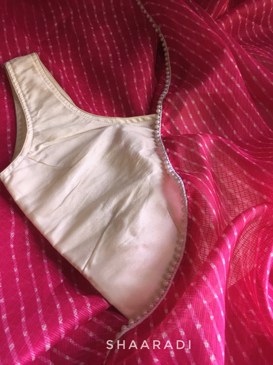 Pearls in Pink Leheriya Saree