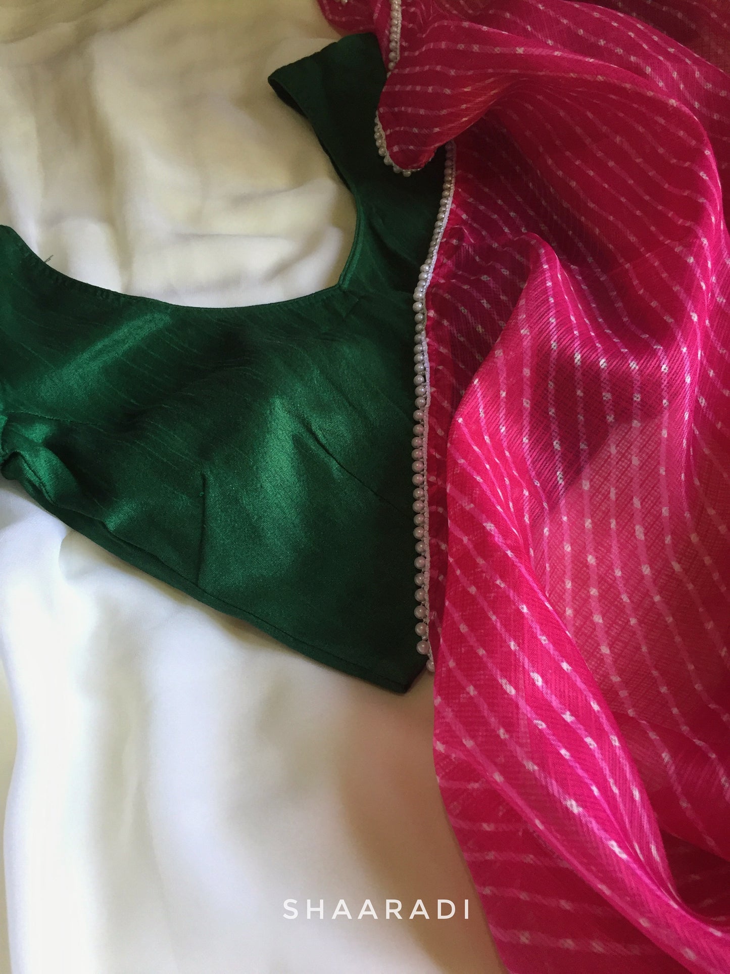 Pearls in Pink Leheriya Saree