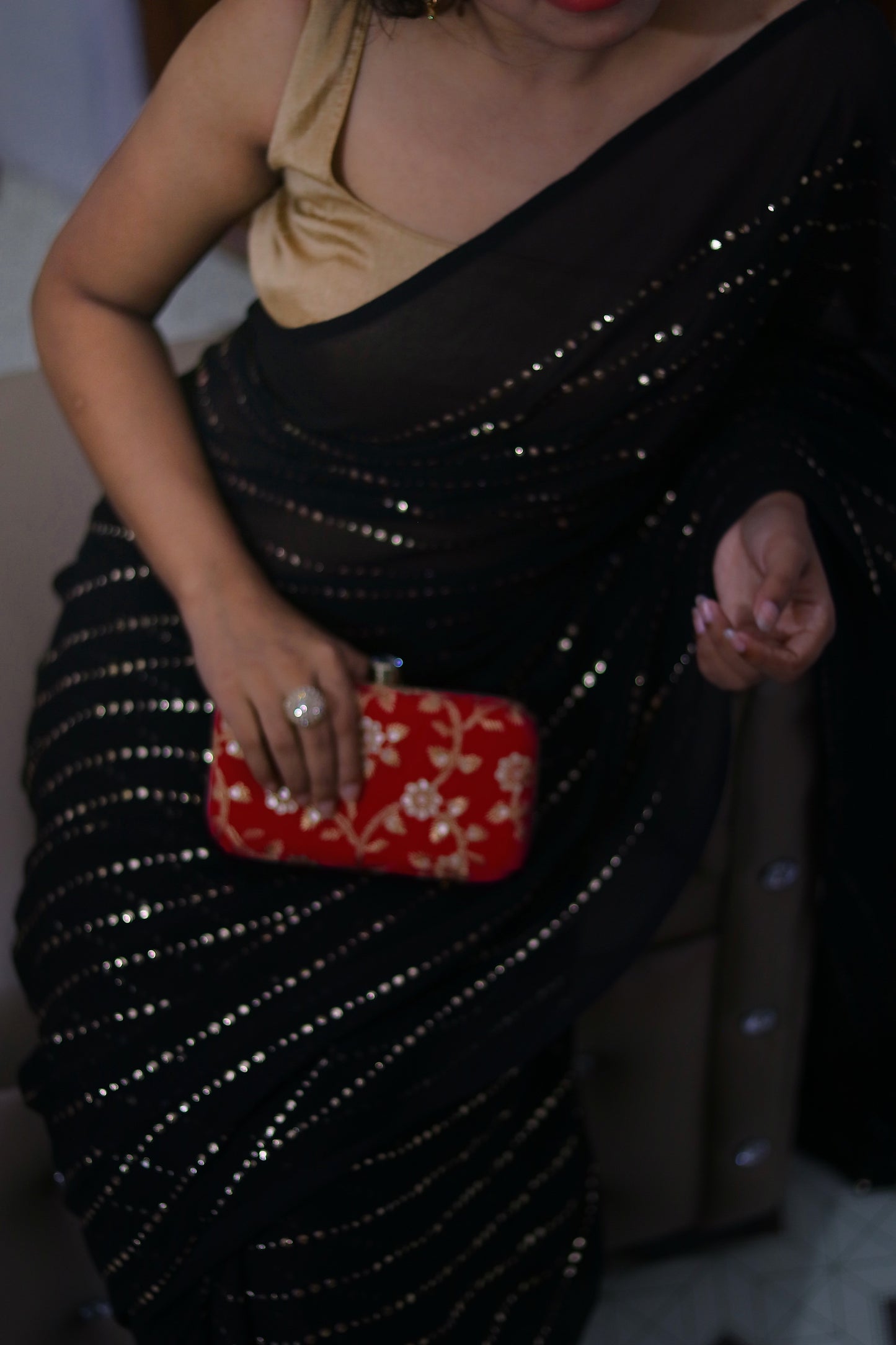 Golden Dreams on Black Saree