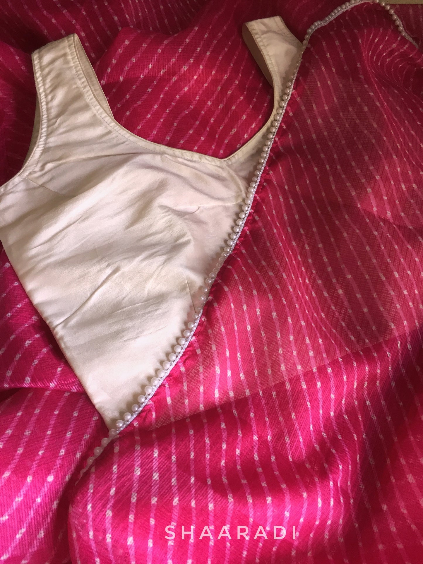 Pearls in Pink Leheriya Saree