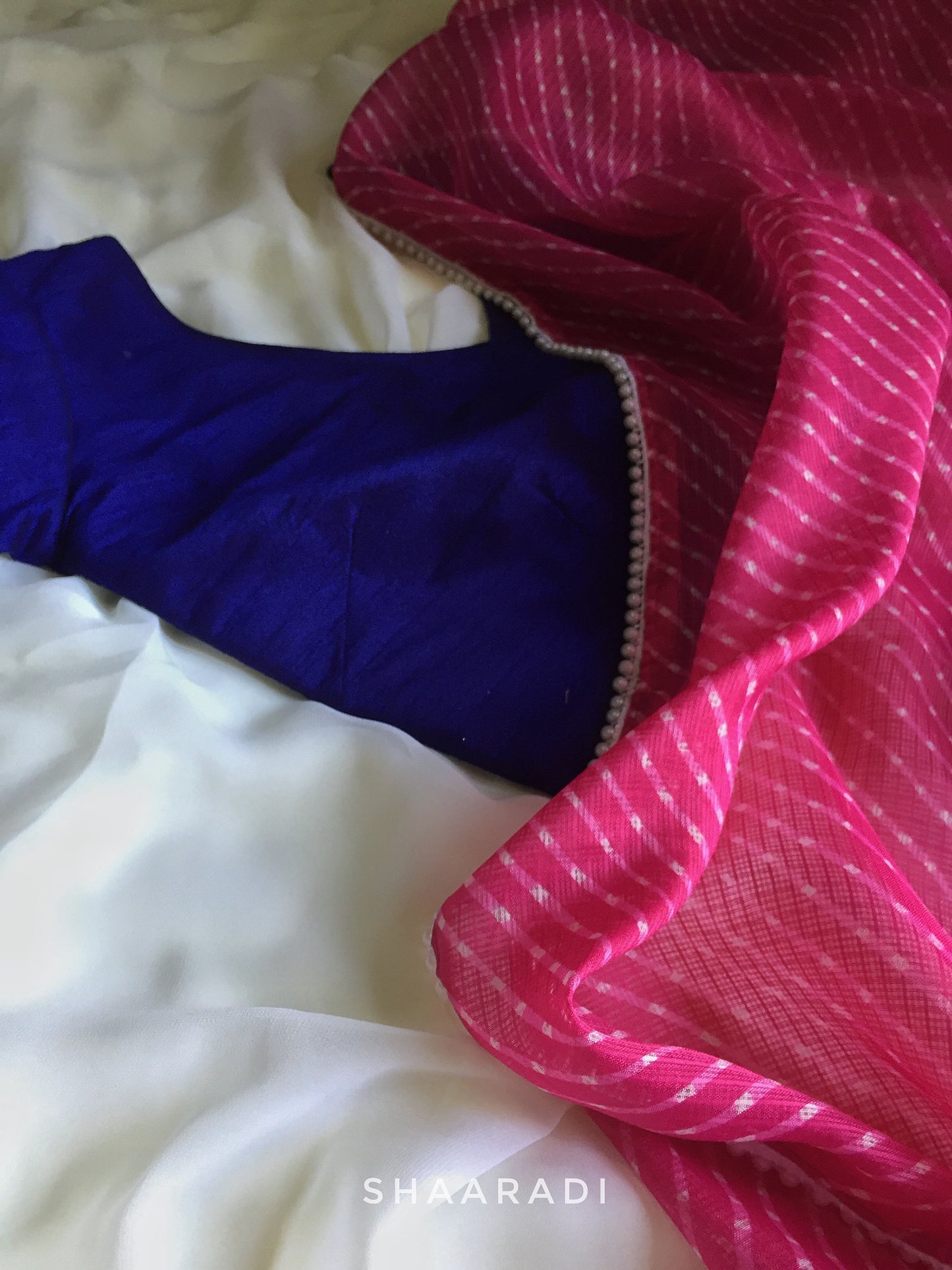 Pearls in Pink Leheriya Saree