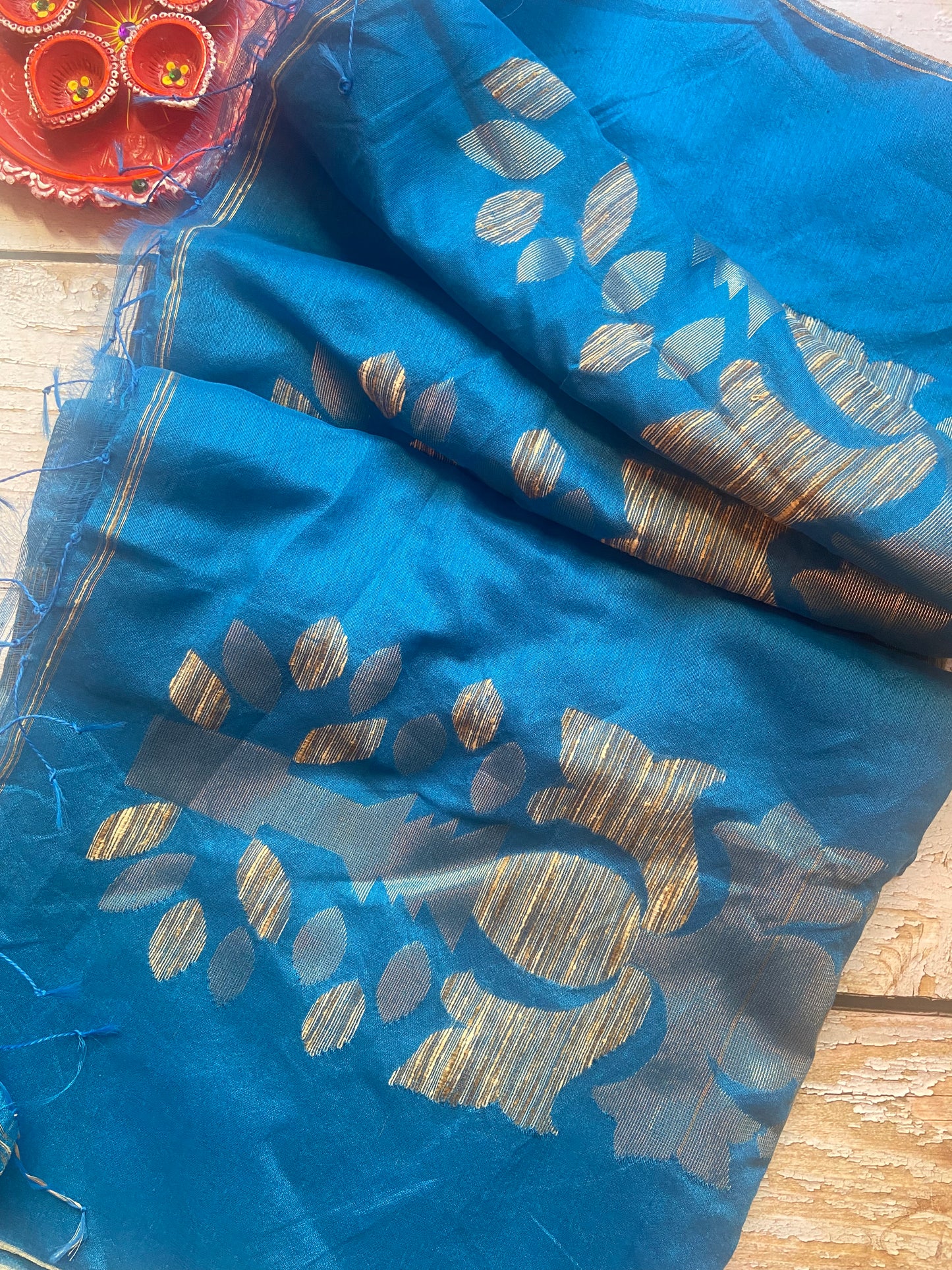 Golden hour on blues Saree