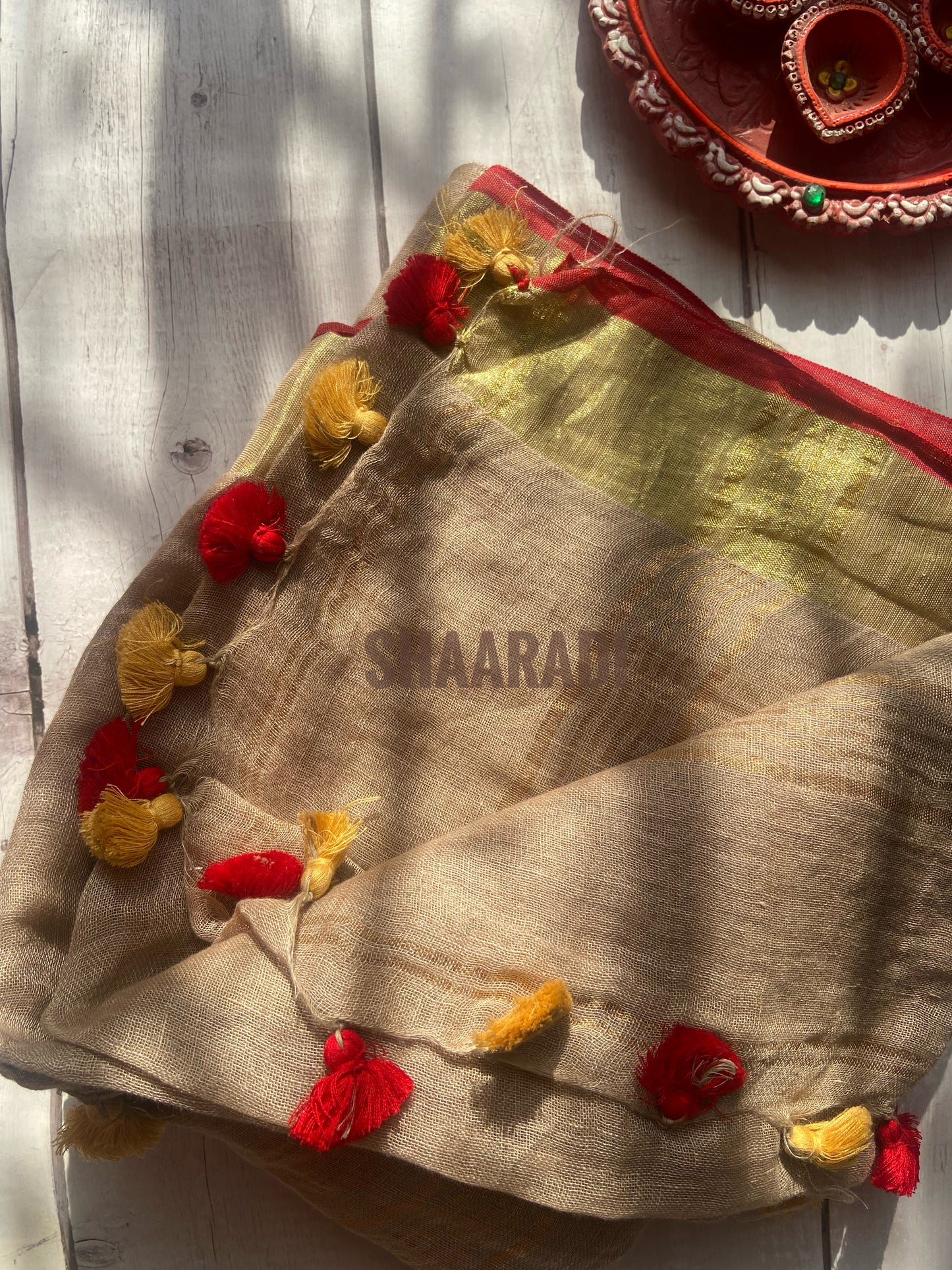 Goldy Beige Linen Saree