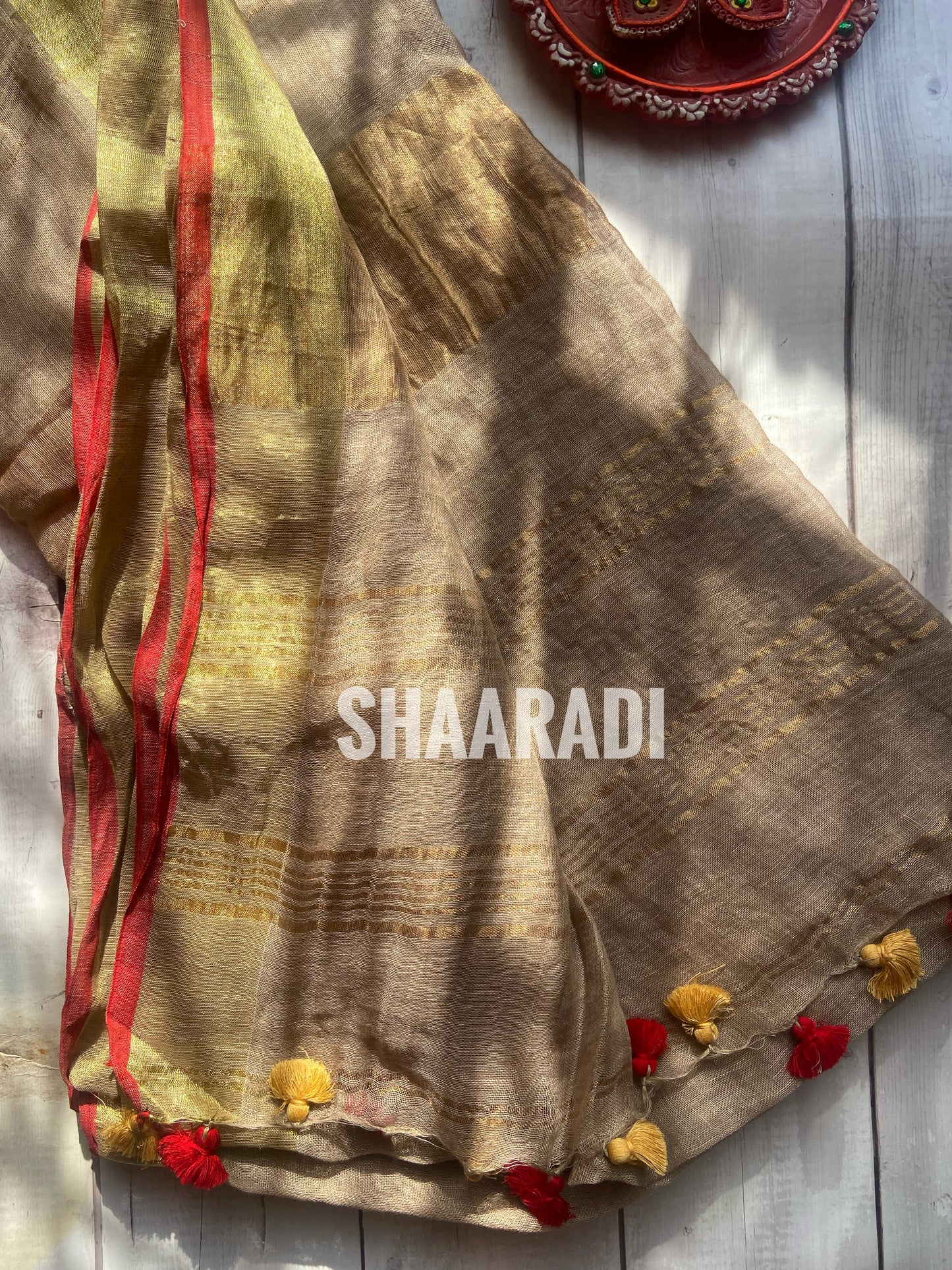 Goldy Beige Linen Saree