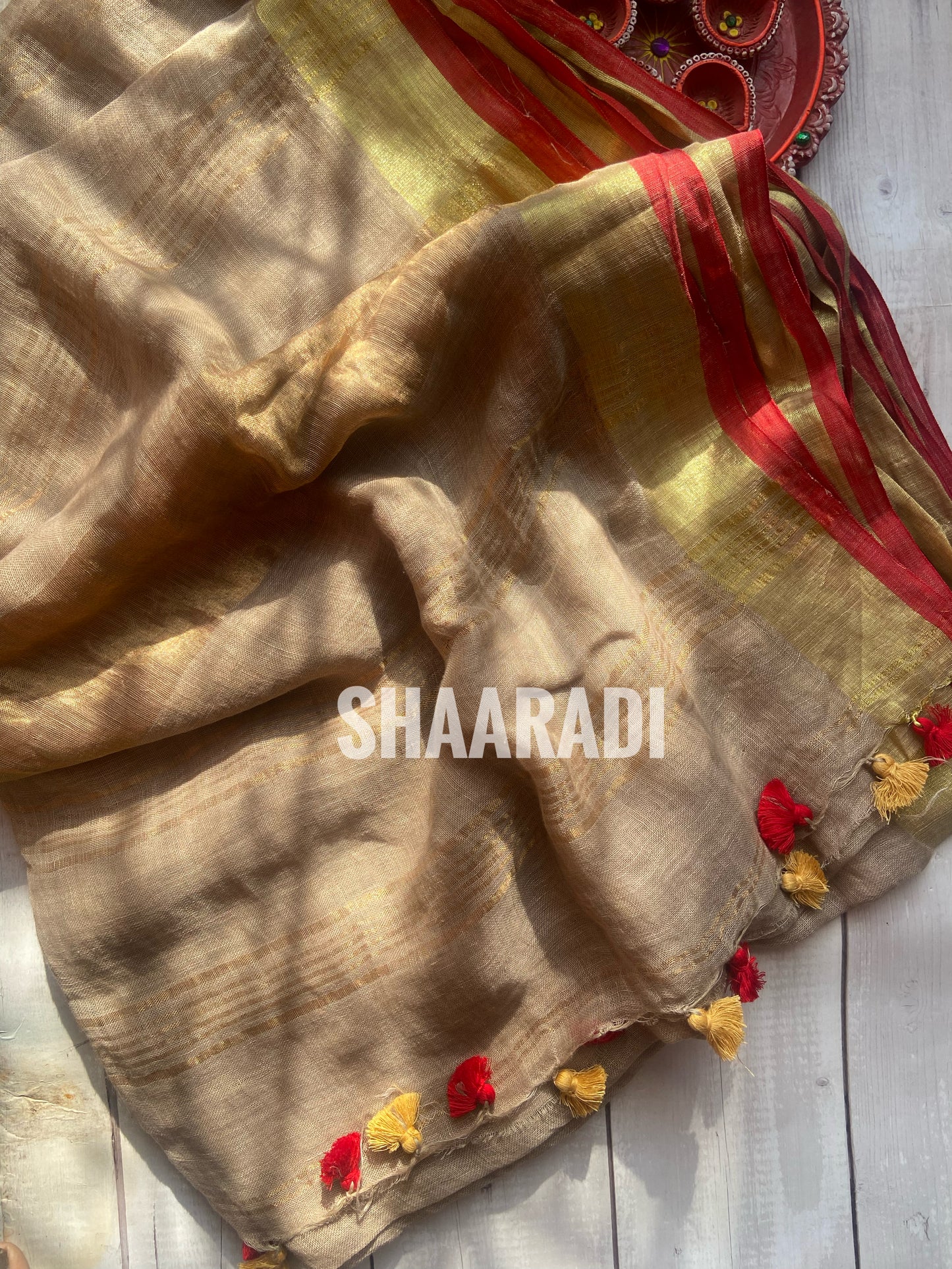 Goldy Beige Linen Saree